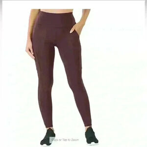 Spyder ladies  yoga cargo leggings with pockets in burgundy size medium